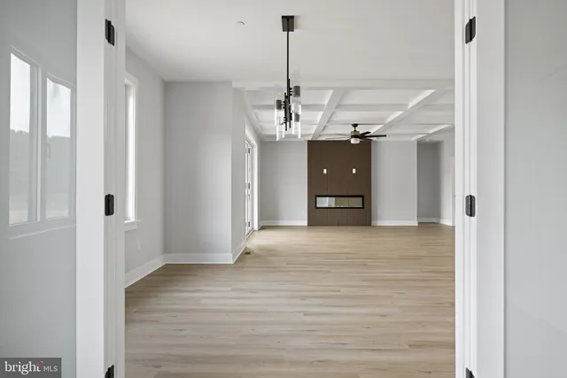 a bathroom with a double vanity sink mirror and toilet