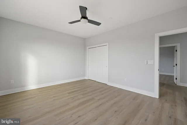 a bathroom with a sink double vanity and a mirror