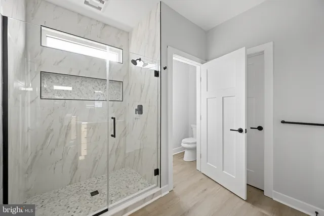 a view of a lake with a house