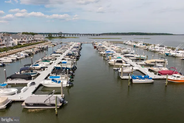 a swimming pool with an outdoor seating space