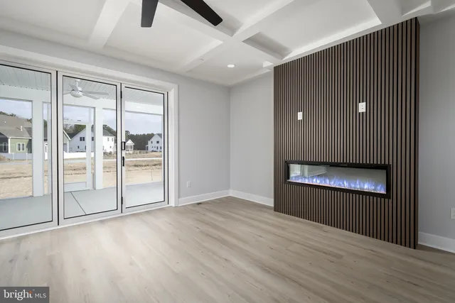 a view of kitchen with wooden floor