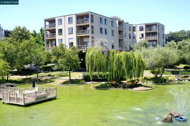 a view of a golf course with chairs