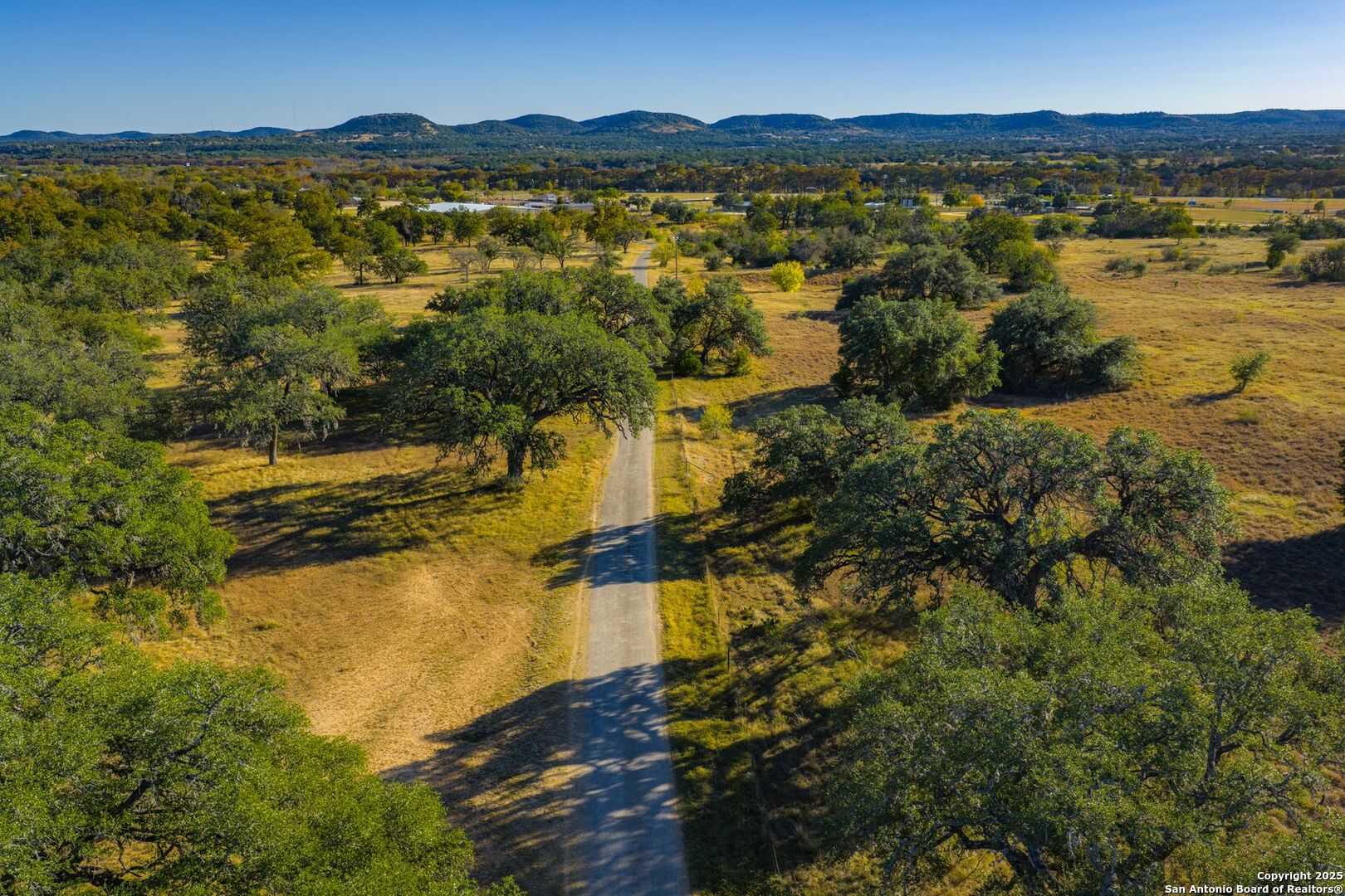 740 Optimist Way Bandera, TX 78003 - Photo 11 of 40 a view of lake and mountain