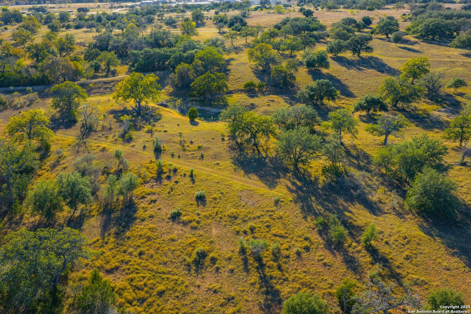740 Optimist Way Bandera, TX 78003 - Photo 14 of 40 a view of a yard
