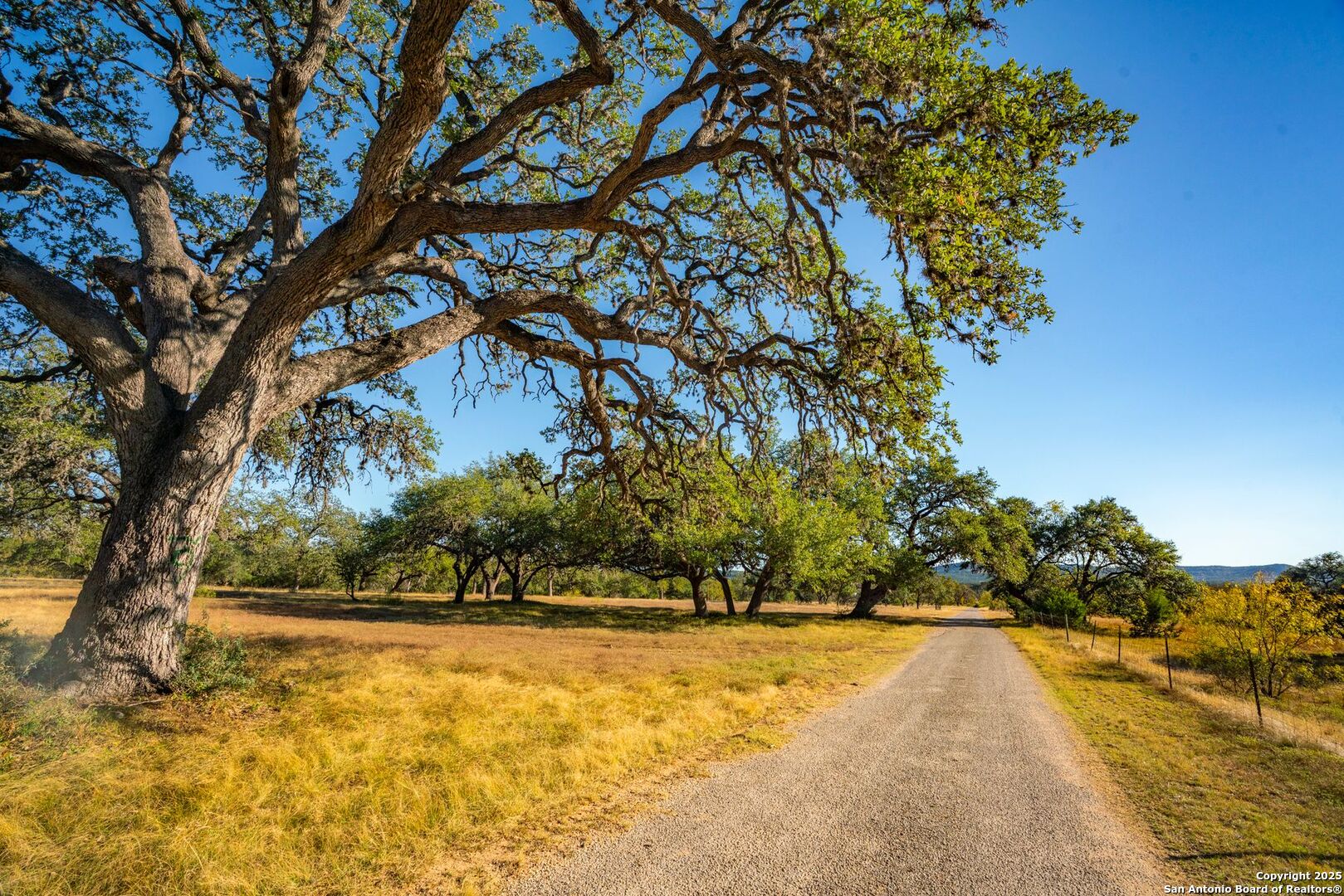 740 Optimist Way Bandera, TX 78003 - Photo 28 of 40 a view of swimming pool with an outdoor space and seating area