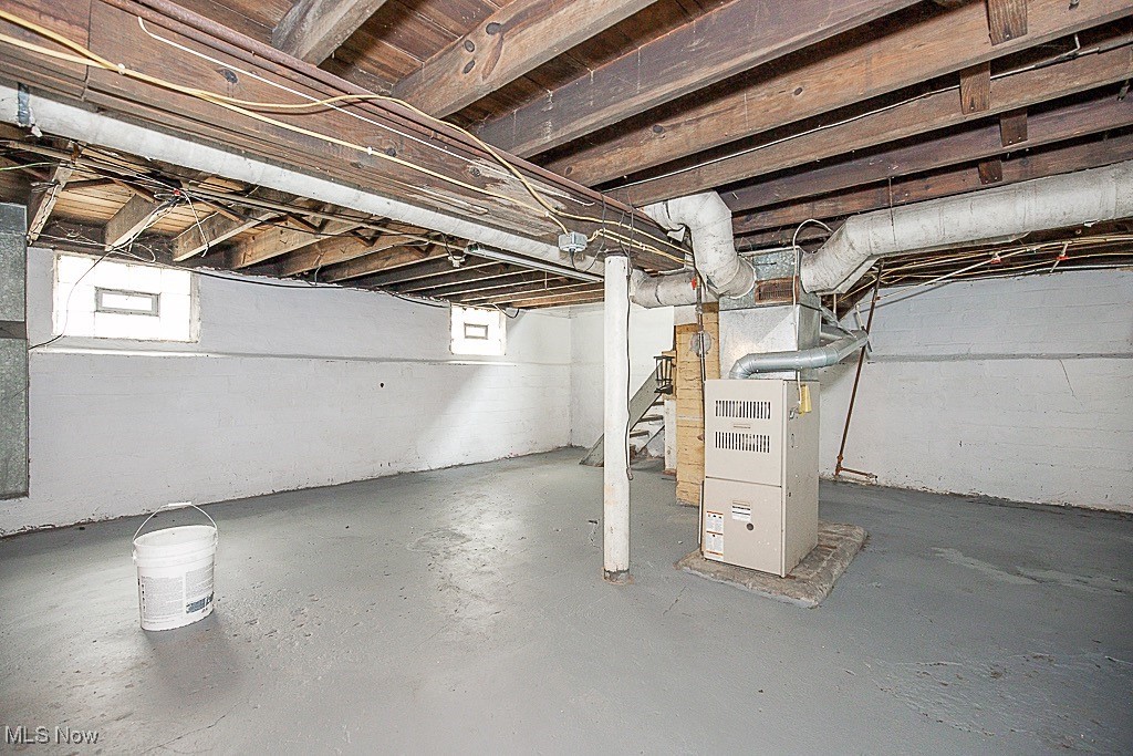 3538 Independence Road Cleveland, OH 44105 - Photo 19 of 24 Below grade area featuring stairway and heating unit