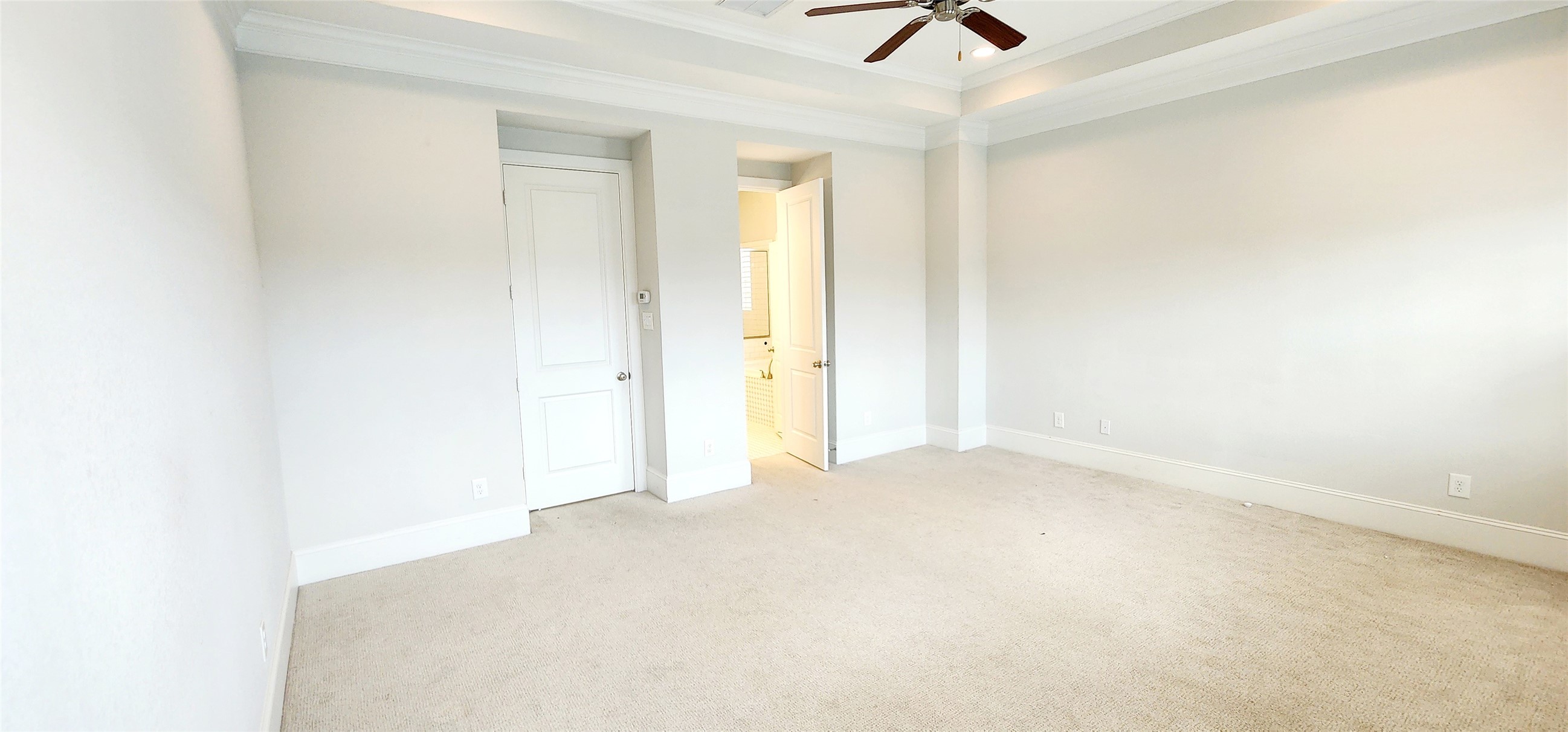 11 West Rafters Row The Woodlands, TX 77380 - Photo 29 of 31 an empty room with fan and windows
