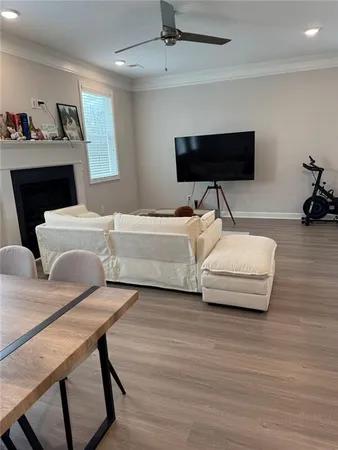 a living room with furniture and a table