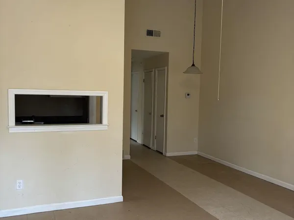 a view of a livingroom with entryway