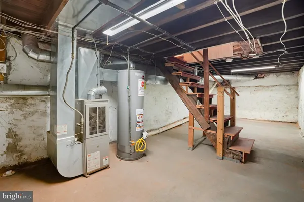 a view of an empty room with storage