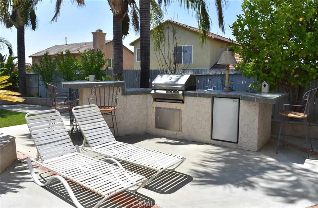 1665 Ravenswood Road Beaumont, CA 92223 - Photo 36 of 41 a front view of a house with balcony