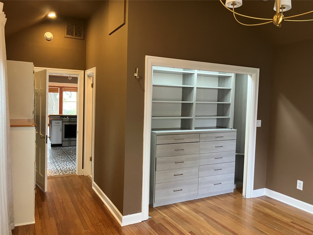 1916 West 39th Street Austin, TX 78731 - Photo 19 of 40 a view of walk in closet with empty racks