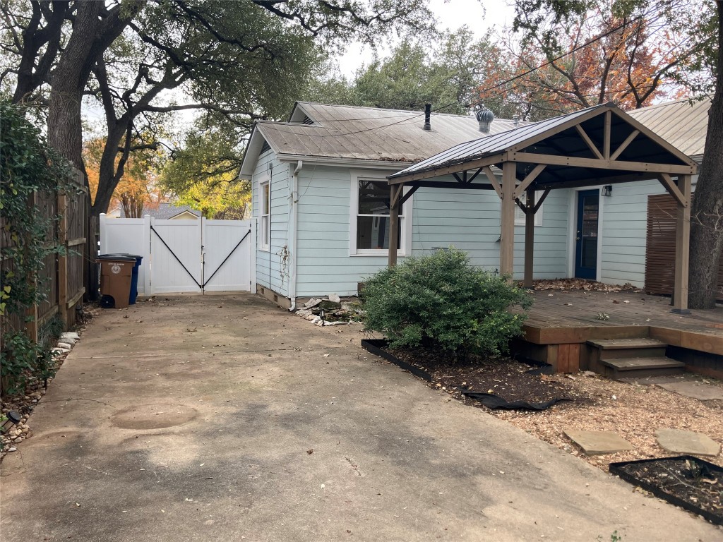1916 West 39th Street Austin, TX 78731 - Photo 24 of 40 a view of a house with a yard and large tree