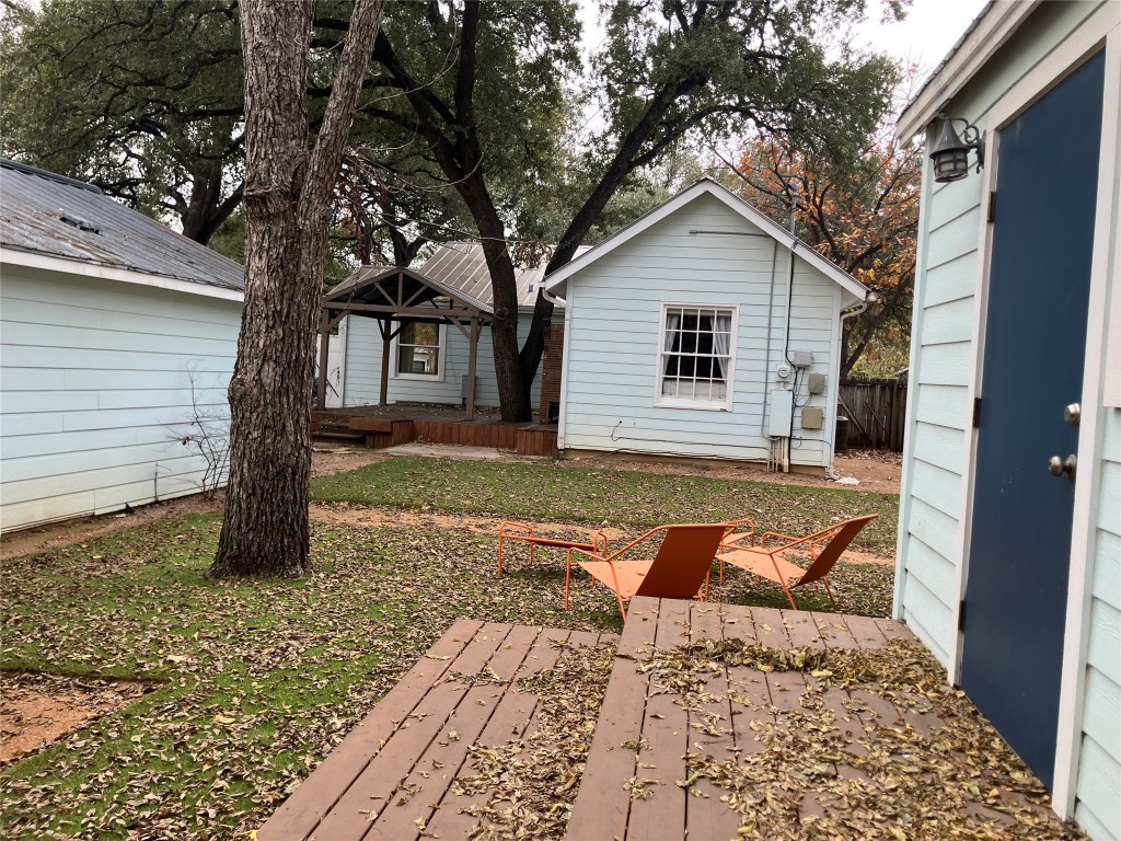 1916 West 39th Street Austin, TX 78731 - Photo 34 of 40 a backyard of a house with large trees