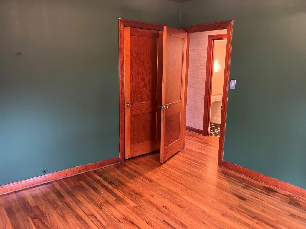 1916 West 39th Street Austin, TX 78731 - Photo 10 of 40 a view of a room with wooden floor and bathroom