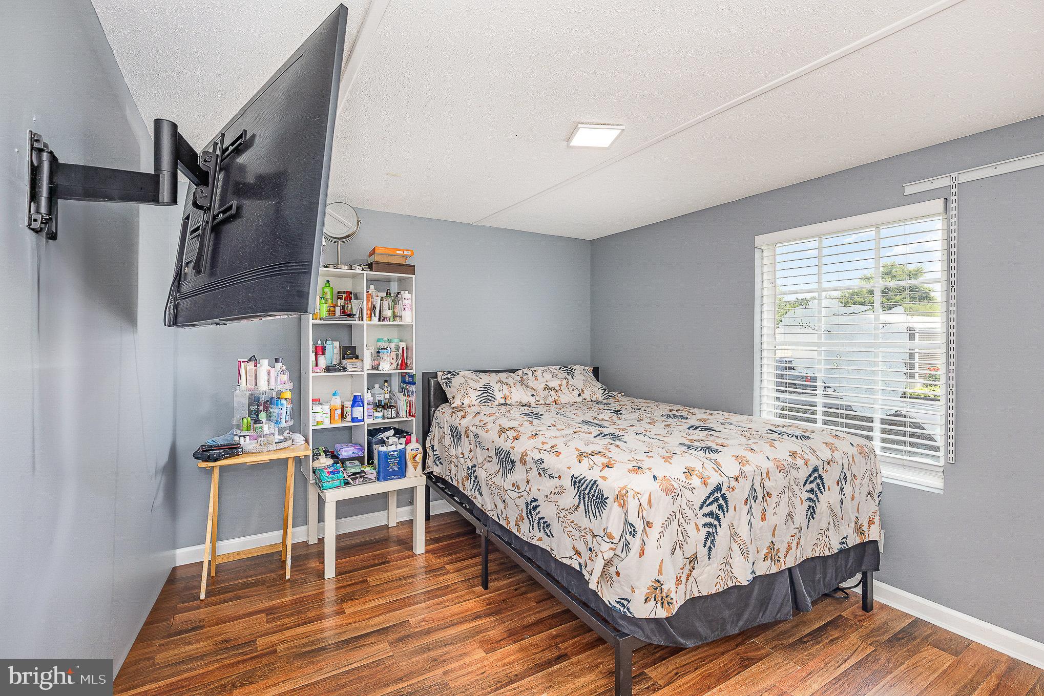 29 Renee Road Stafford, VA 22556 - Photo 19 of 24 a bedroom with a bed and a table in it