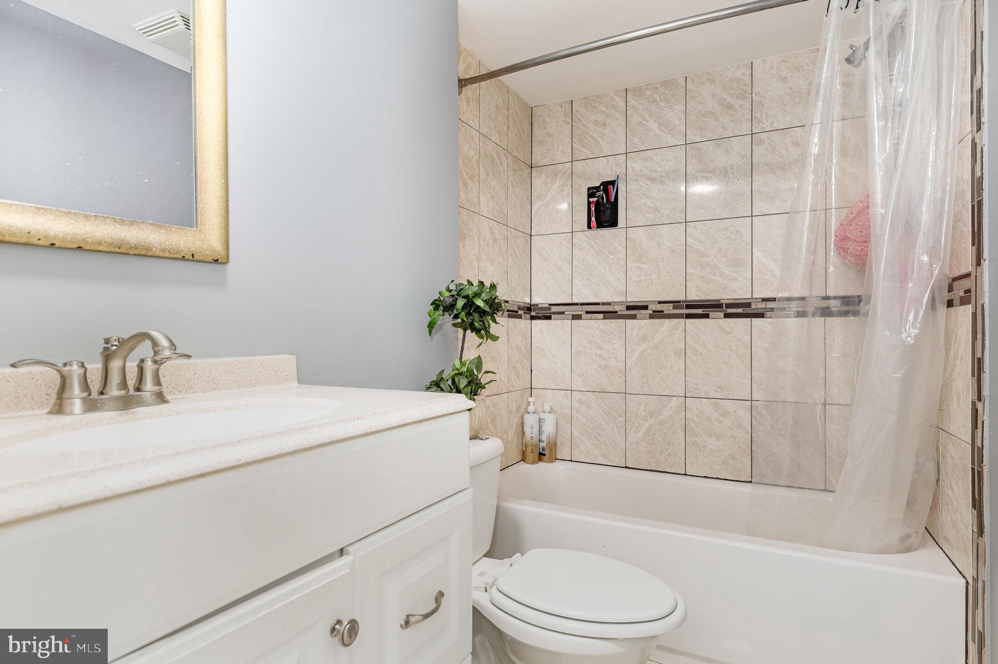 29 Renee Road Stafford, VA 22556 - Photo 21 of 24 a bathroom with a sink toilet and shower