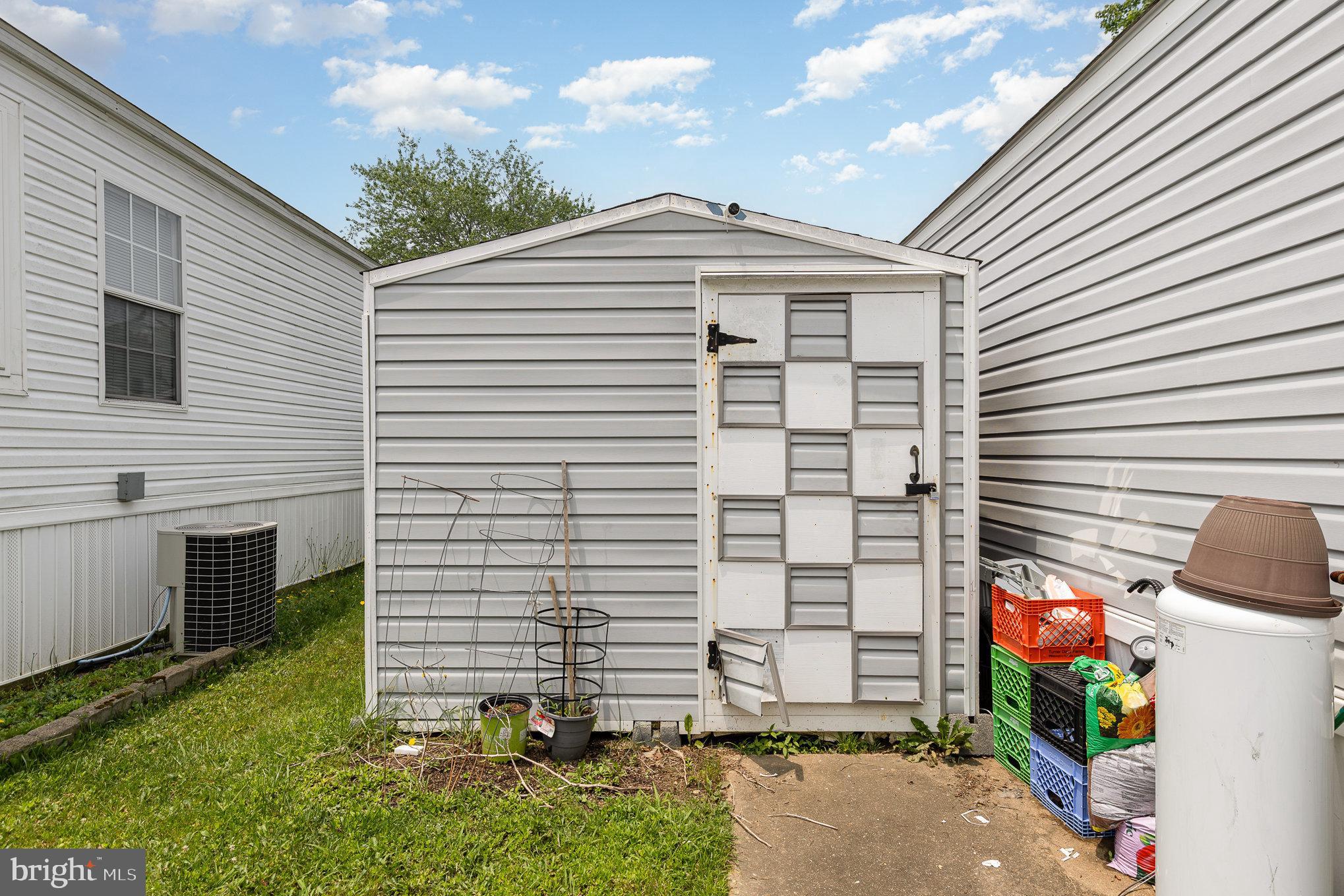 29 Renee Road Stafford, VA 22556 - Photo 22 of 24 a view of a house with a yard and plants