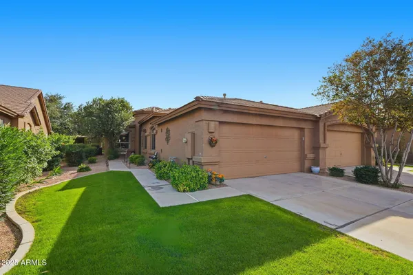 a view of a back yard of the house