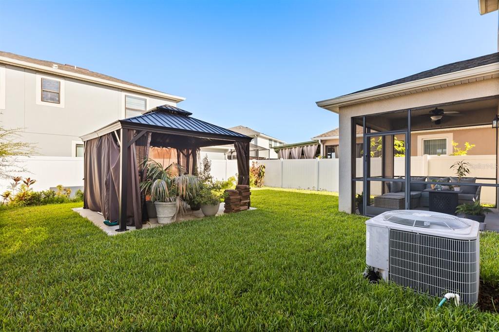 2417 Chateau Loop Kissimmee, FL 34741 - Photo 14 of 16 a view of outdoor space yard and patio