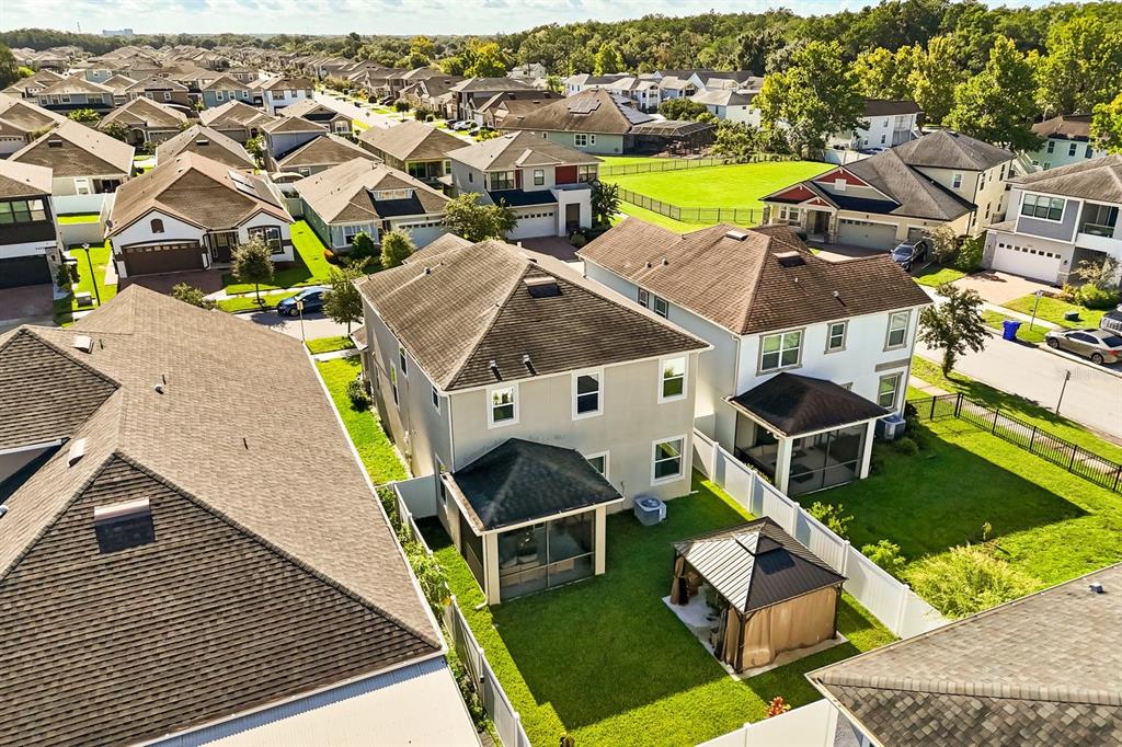 2417 Chateau Loop Kissimmee, FL 34741 - Photo 16 of 16 an aerial view of residential houses with outdoor space