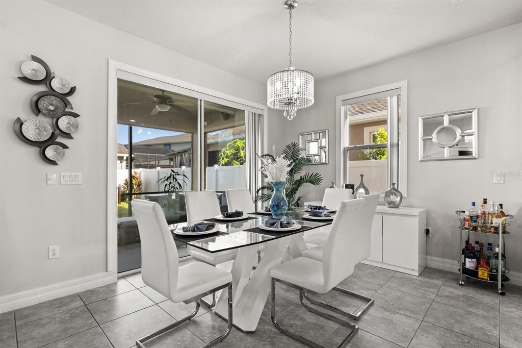 2417 Chateau Loop Kissimmee, FL 34741 - Photo 6 of 16 a view of a dining room and workspace