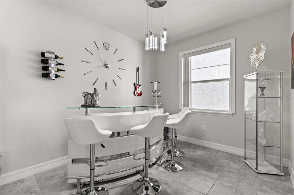 2417 Chateau Loop Kissimmee, FL 34741 - Photo 7 of 16 a view of a room with gym equipment