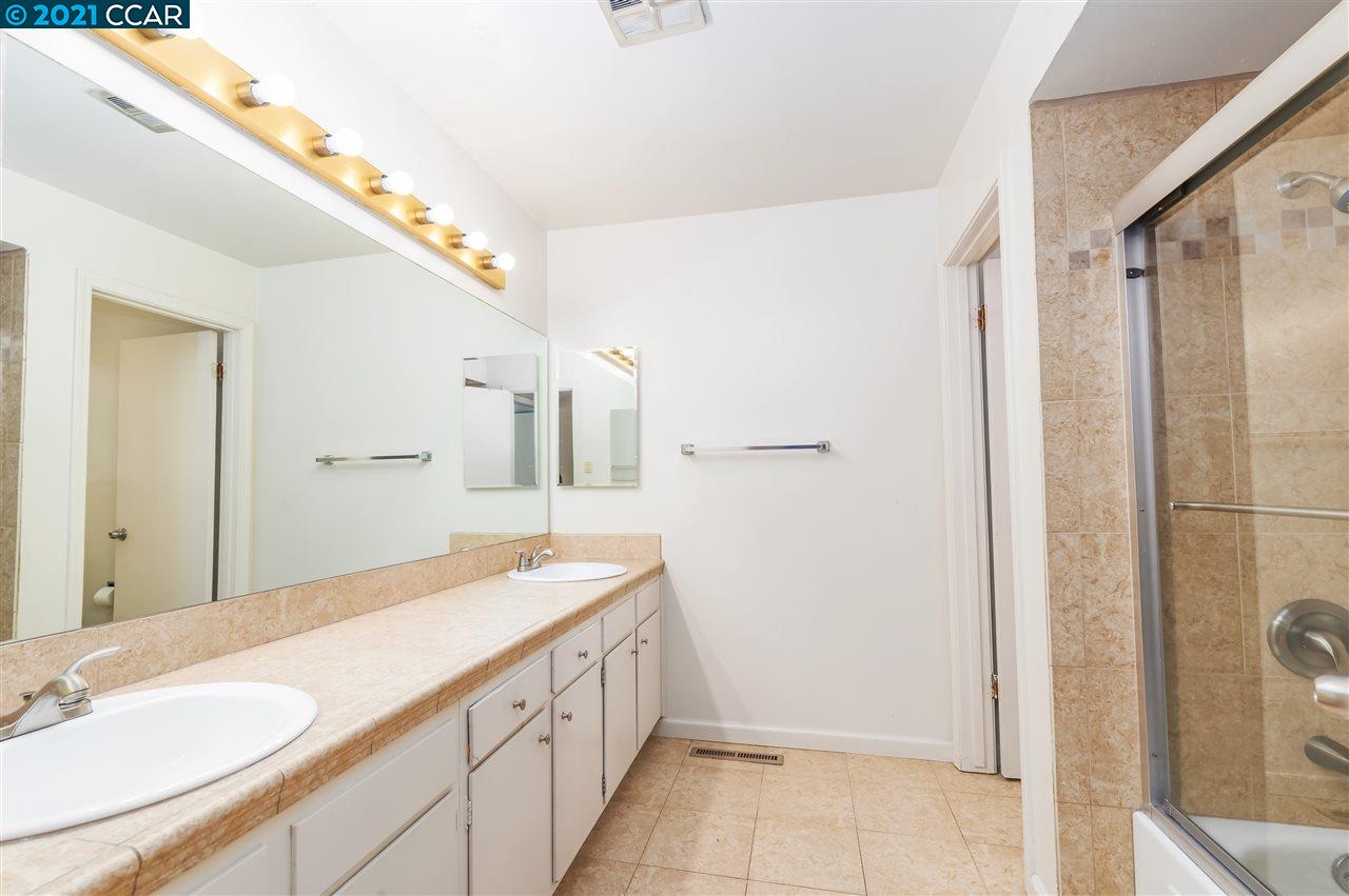 348 Barrett Circle Danville, CA 94526 - Photo 18 of 23 a bathroom with a sink and a mirror