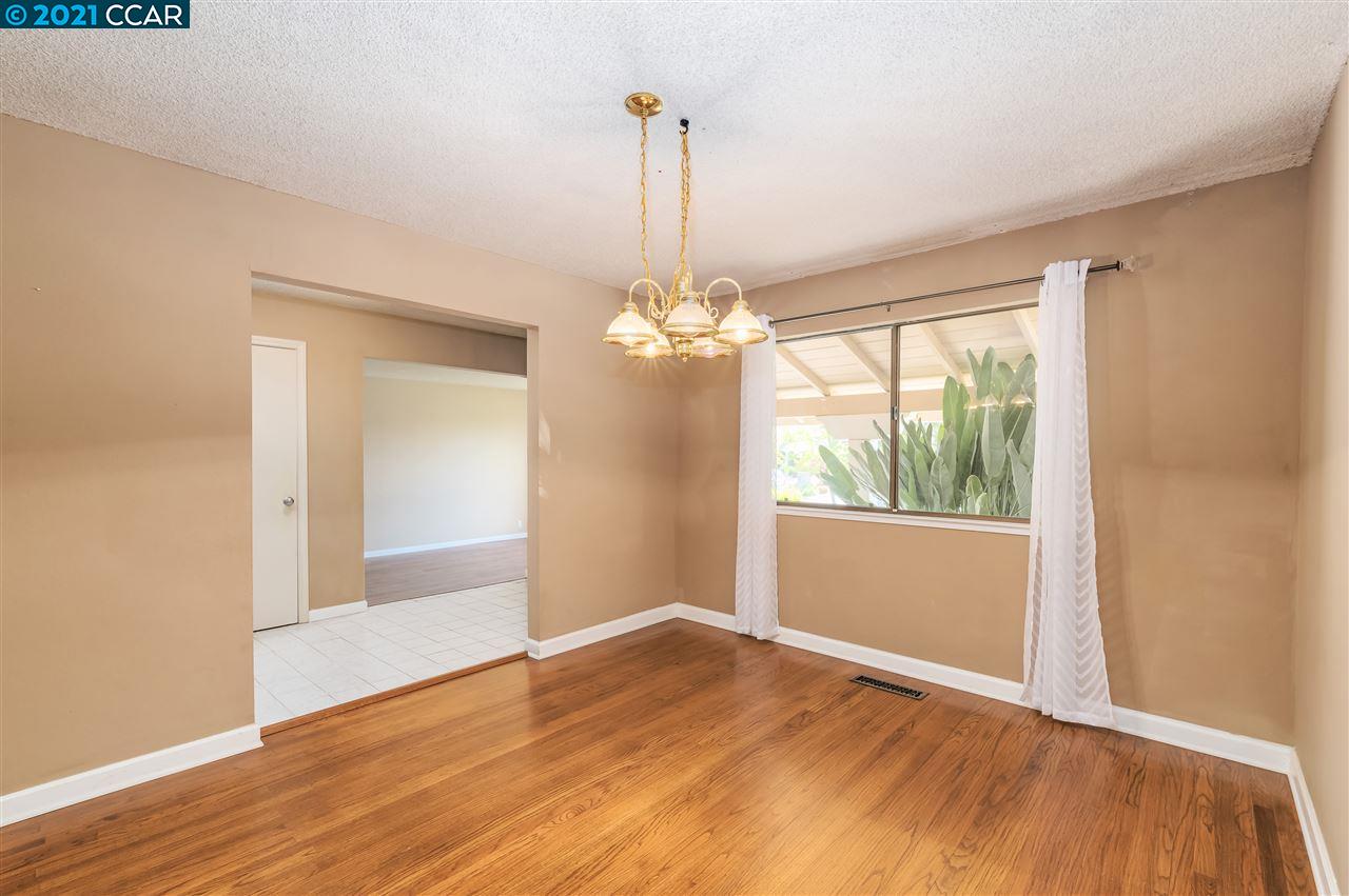 348 Barrett Circle Danville, CA 94526 - Photo 6 of 23 a view of empty room with wooden floor and fan