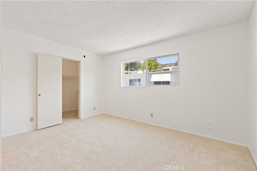 9502 Vía Salerno Burbank, CA 91504 - Photo 10 of 18 an empty room with windows
