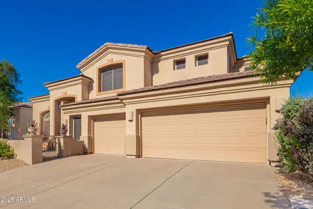 a front view of a house with a garage