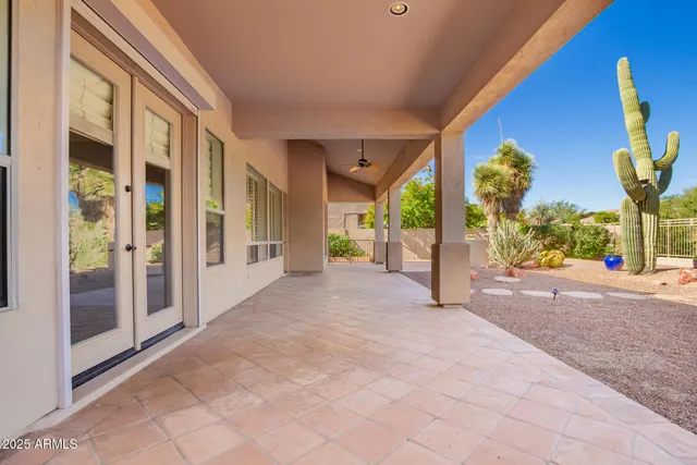 a view of a porch with seating space