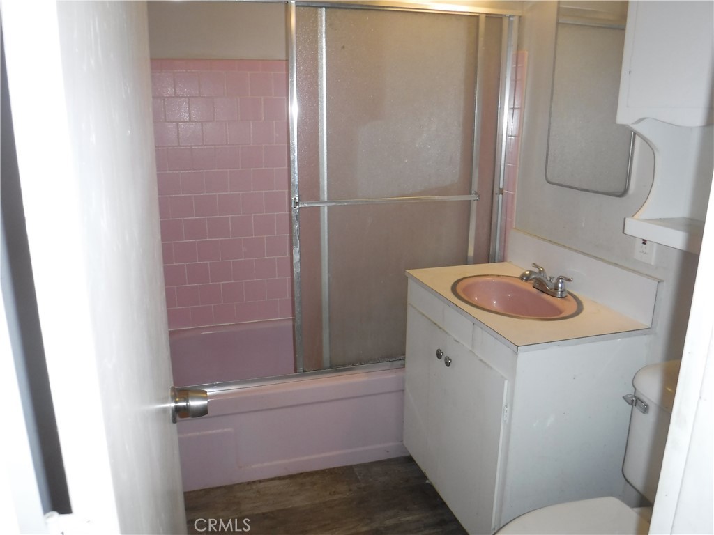 706 West Carroll Avenue Glendora, CA 91741 - Photo 10 of 24 a bathroom with a sink a toilet and shower