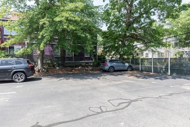 a car parked in front of a house