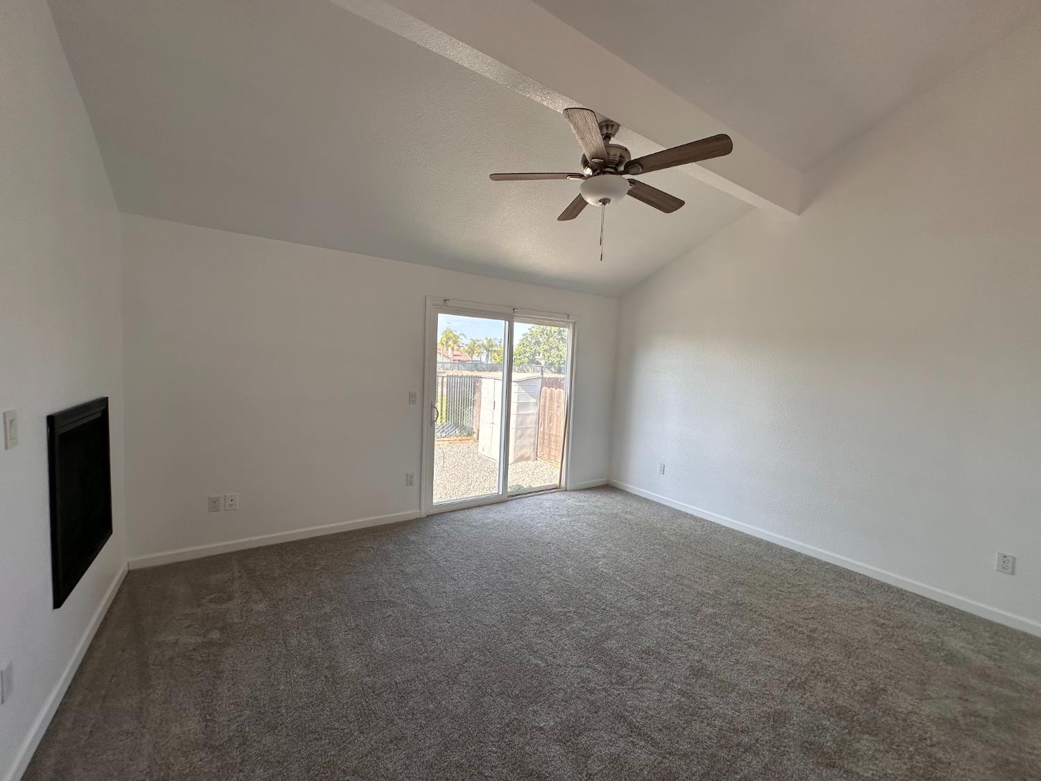 911 Toro Lane Lathrop, CA 95330 - Photo 12 of 36 Primary Bedroom with slider to the bedyard.