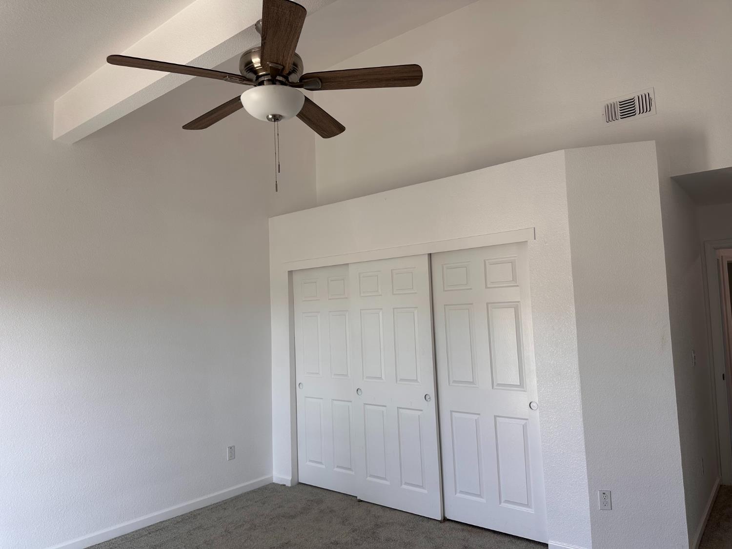 911 Toro Lane Lathrop, CA 95330 - Photo 13 of 36 Primary Bedroom with ceiling fan