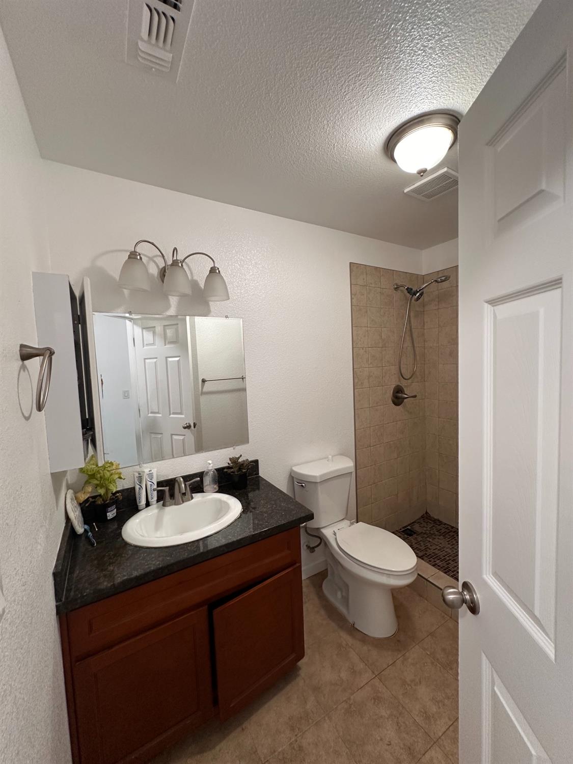 911 Toro Lane Lathrop, CA 95330 - Photo 25 of 36 Hall Bath