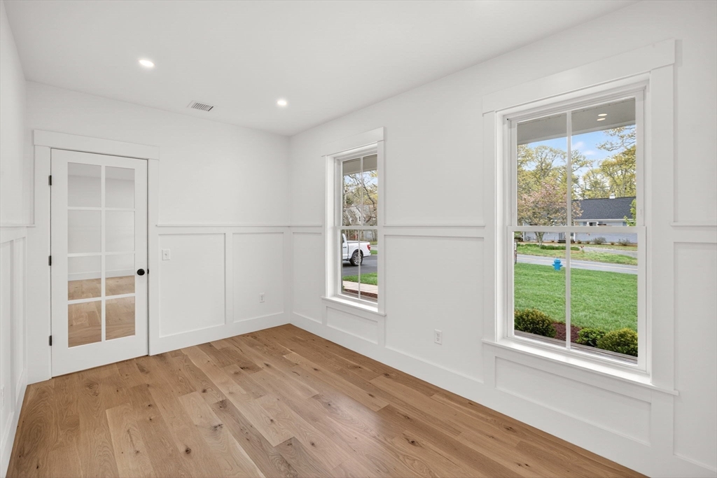 132 Great Western Road Harwich, MA 02645 - Photo 23 of 42 a view of empty room with wooden floor and fan