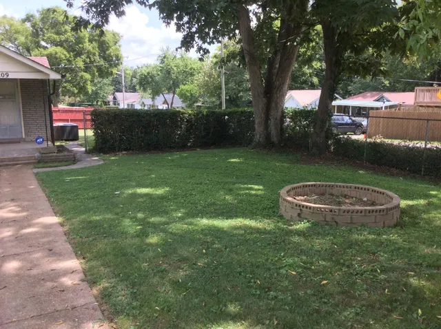 a view of a garden with a slide