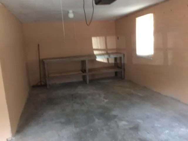 a view of entryway and workspace