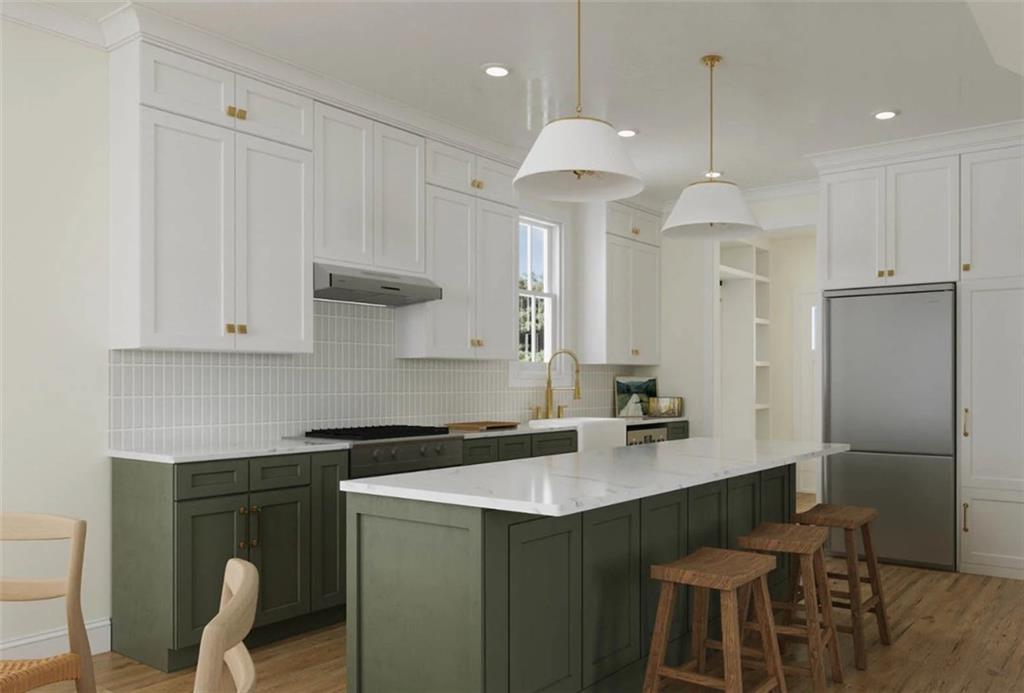 71 Chestatee Road Cleveland, GA 30528 - Photo 10 of 17 a kitchen with stainless steel appliances granite countertop a sink a stove a refrigerator and island