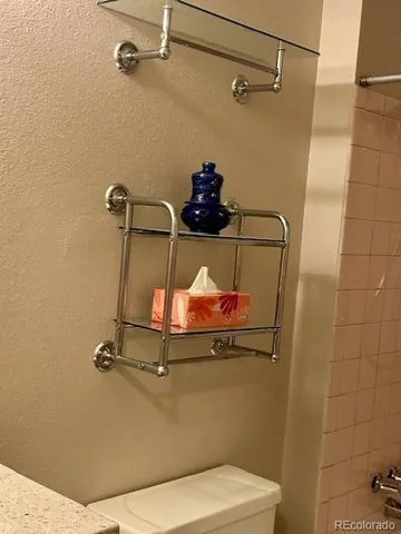 a bathroom with a sink and toilet