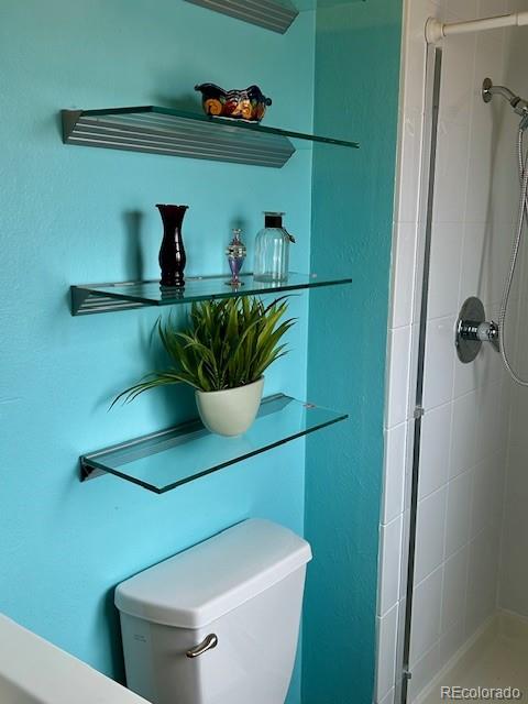 1009 Acadia Avenue Lafayette, CO 80026 - Photo 26 of 46 a bathroom with a sink and toilet