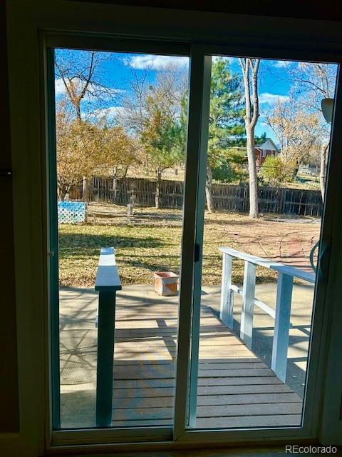 1009 Acadia Avenue Lafayette, CO 80026 - Photo 37 of 46 a view of a glass door with a large window