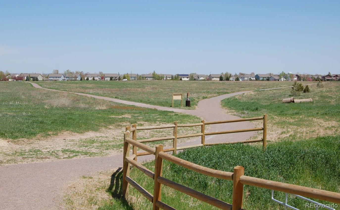 1009 Acadia Avenue Lafayette, CO 80026 - Photo 42 of 46 a view of a lake from a balcony