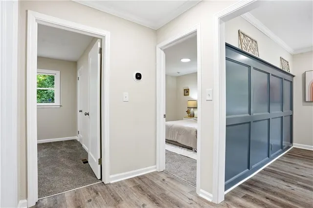 a view of a bathroom from a hallway