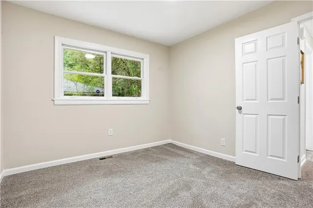 an empty room with closet