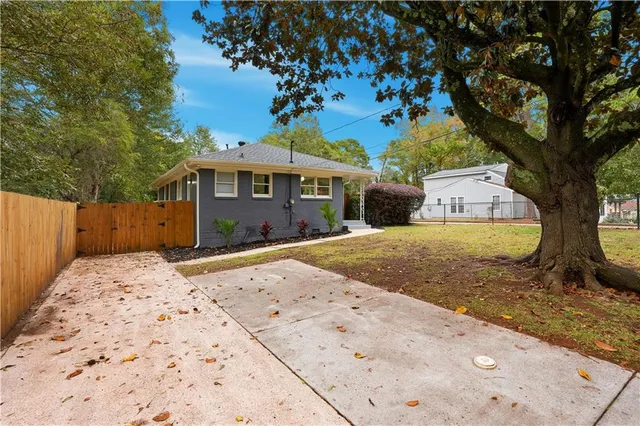 a front view of a house having yard