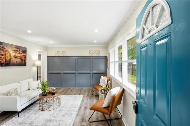 a living room with furniture and window