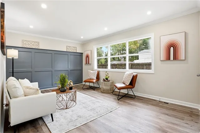 a living room with furniture and a window